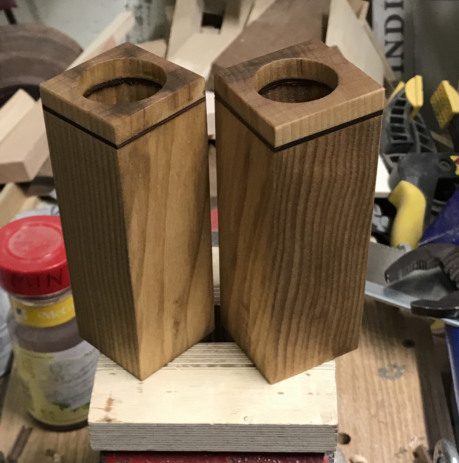 The two holders just out of the oil and wiped down.